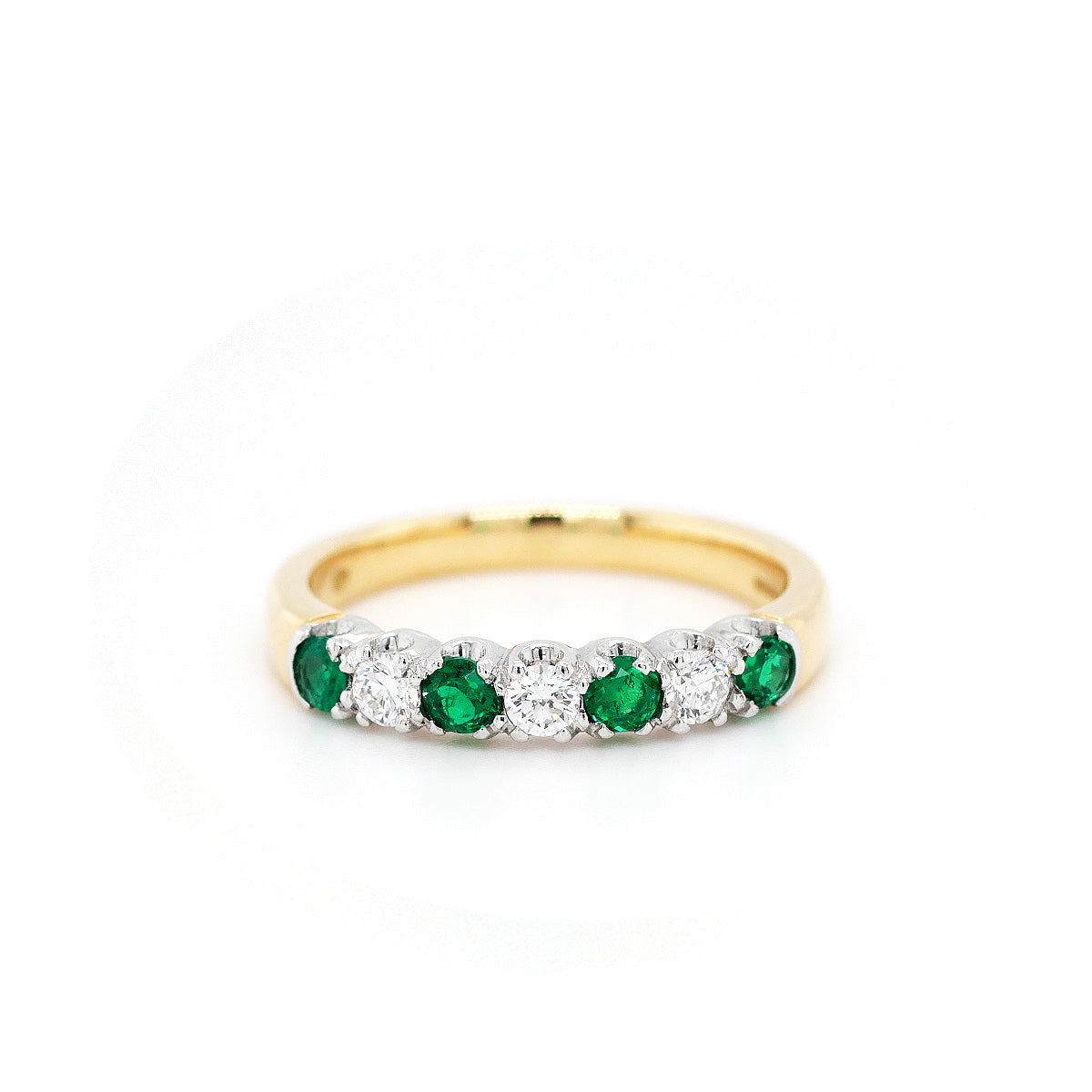 18ct Yellow And White Gold Emerald And Diamond Claw Set 7 Stone Ring