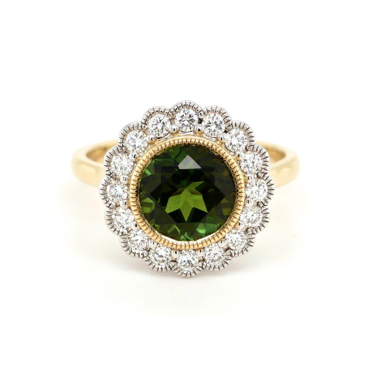 18ct Yellow and White Gold Green Tourmaline and Diamond Halo ring