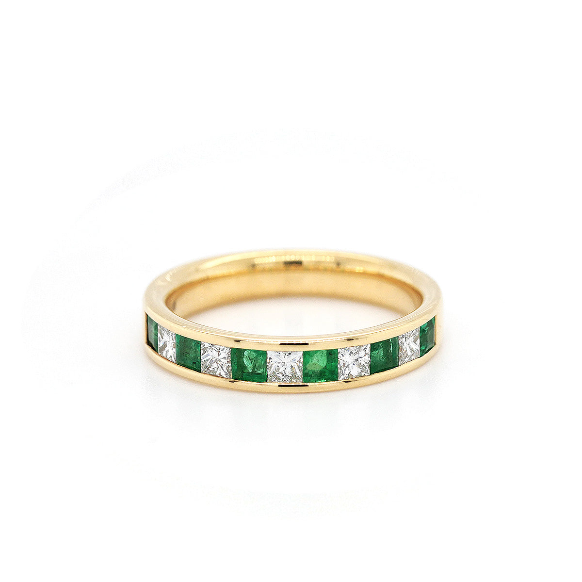 18ct Yellow Gold Channel Set Diamond and Emerald Eternity Ring