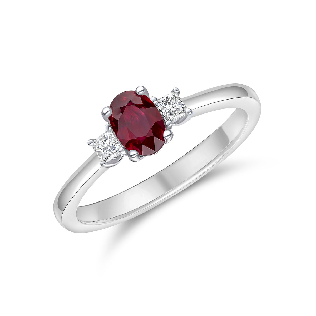 18CT WG OVAL RUBY AND PRINCESS CUT DIAMOND CLAW SET 3ST RING