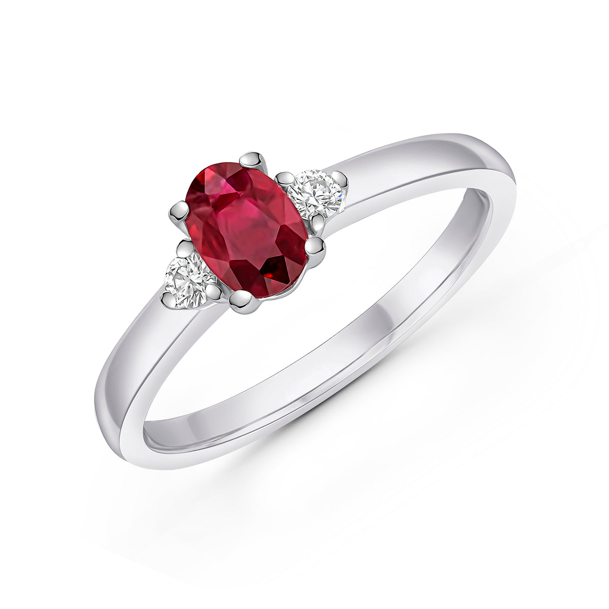18CT WG OVAL RUBY AND ROUND DIAMOND CLAW SET 3ST RING