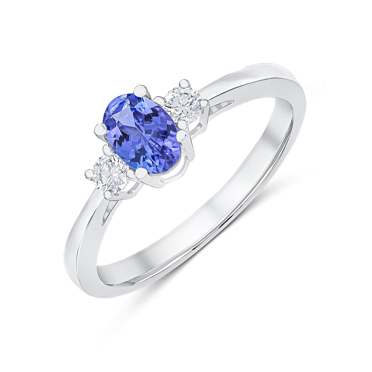 18CT WG 6X4 OVAL TANZANITE & DIAMOND CLAW SET 3 STONE RING