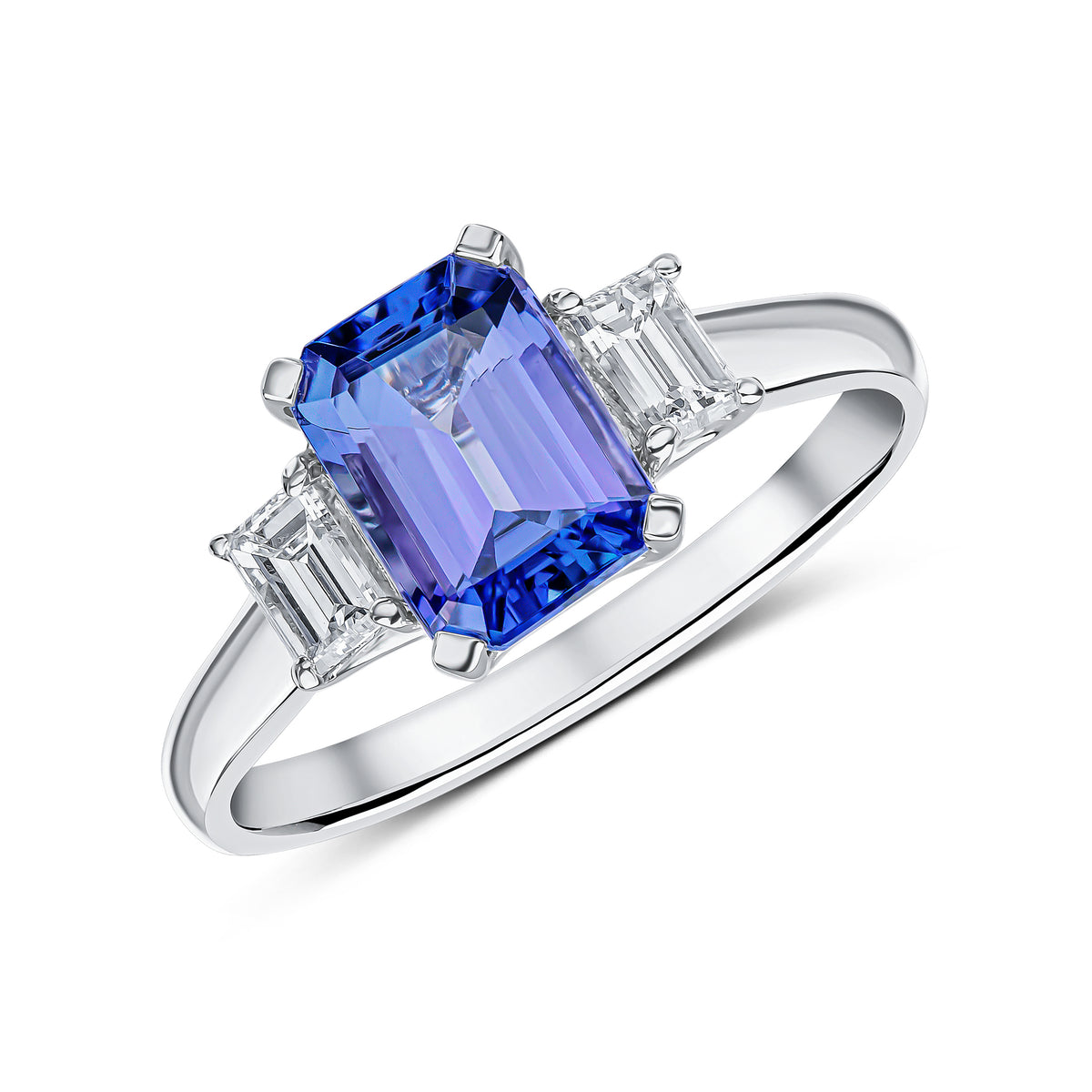 18CT WG 8X6 OCTAGON TANZANITE AND BAGUETTE DIAMOND CLAW SET 3ST RING