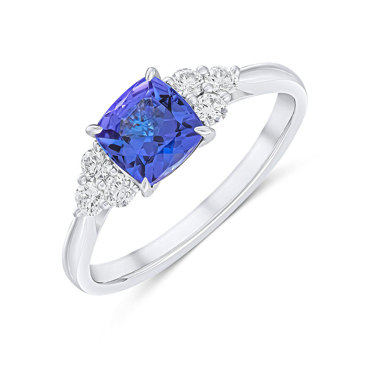 18CT WG 6MM CUSHION TANZANITE AND ROUND DIAMOND TREFOIL SHOULDERS CLAW SET RING