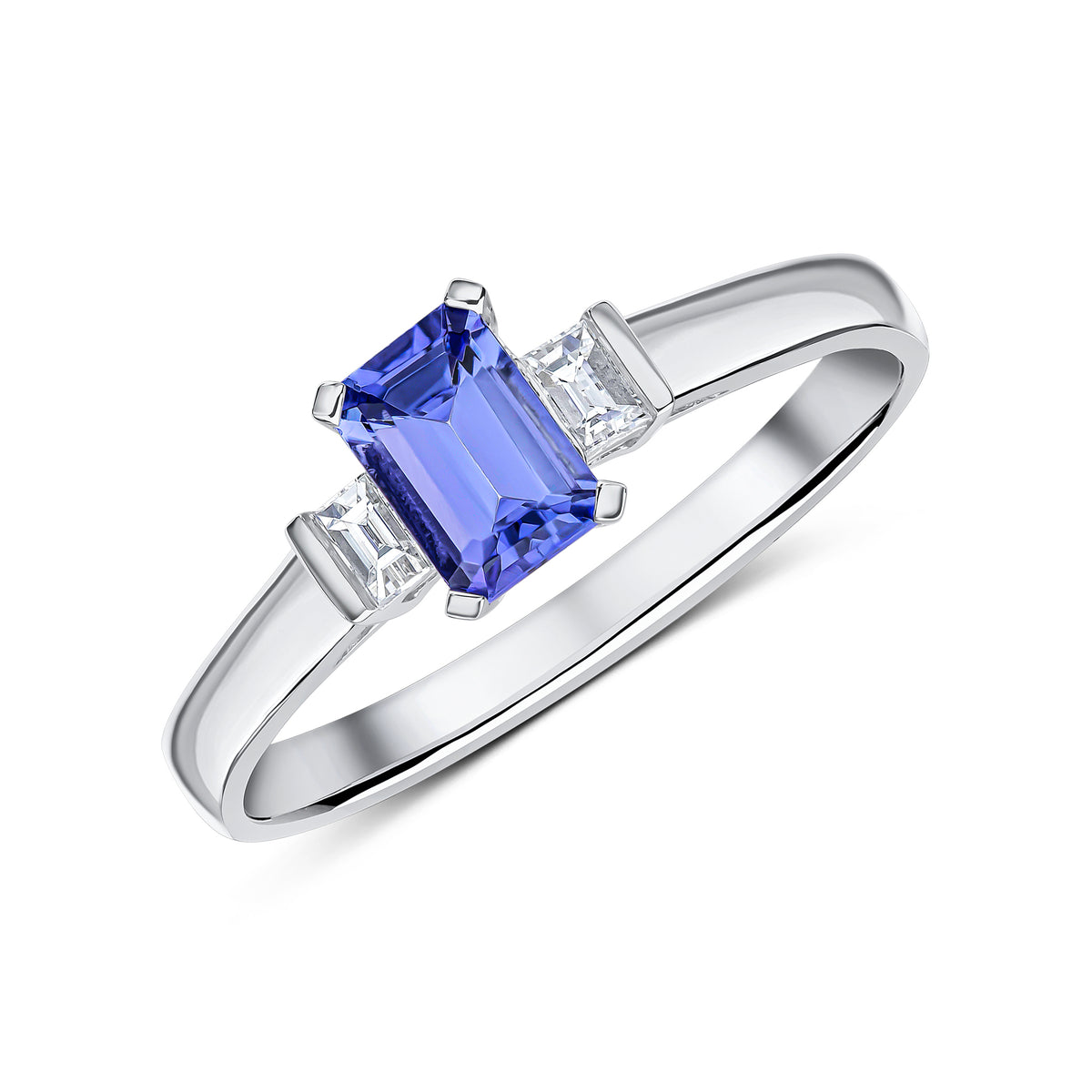 18CT WG 6X4 OCTAGON TANZANITE AND BAGUETTE DIAMOND CLAW SET 3ST RING