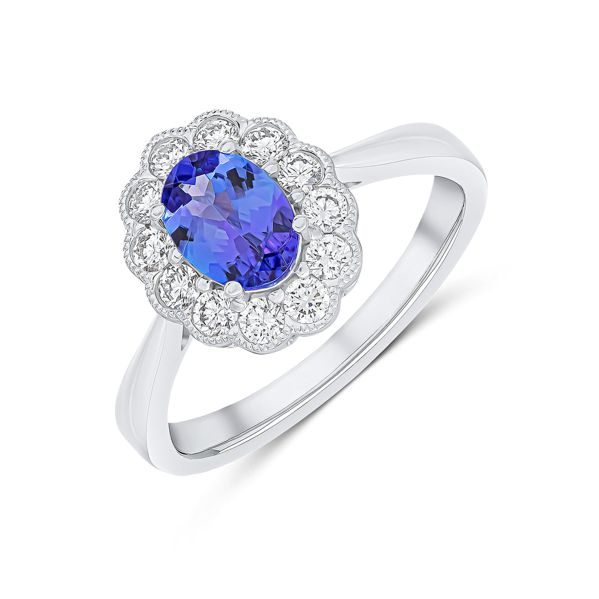 18CT WG 7X5 CLAW SET OVAL TANZANITE AND MILLEGRAIN ROUND DIAMOND CLUSTER RING