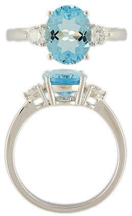 18CT WG 9X7 OVAL AQUA AND ROUND DIAMOND CLAW SET 3ST RING