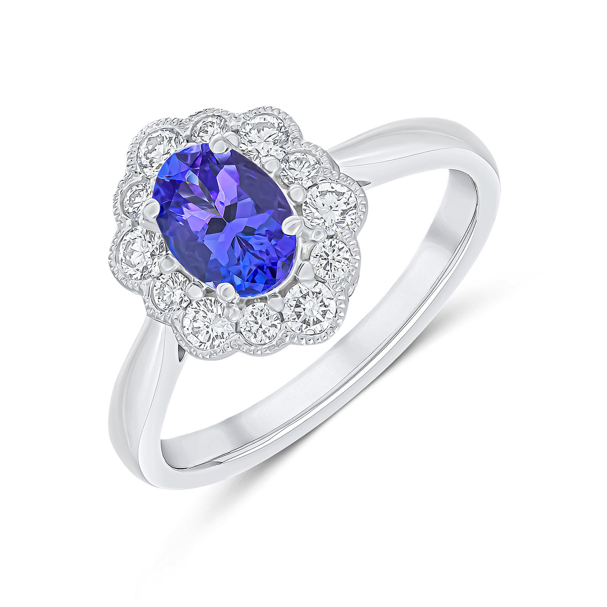 PLATINUM OVAL TANZANITE & DIAMOND CLUSTER RING