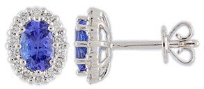 18CT WG 6X4 OVAL TANZANITE AND ROUND DIAMOND CLAW SET CLUSTER EARRINGS