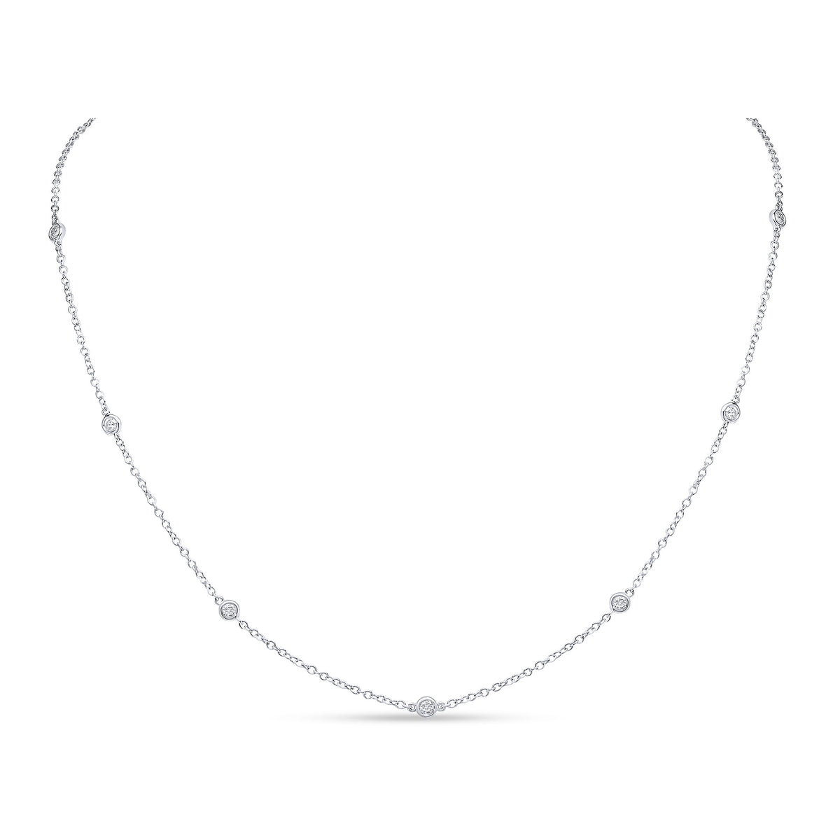 18CT WG ROUND DIAMOND SPEC SET CHAIN NECKLACE. 18"