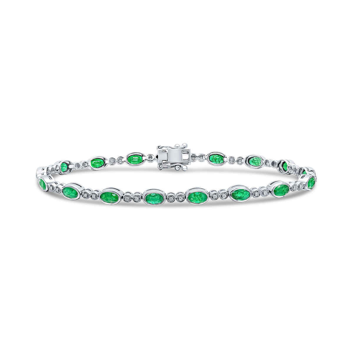 18CT WG OVAL EMERALD AND 2ST ROUND DIAMOND RUBOVER LINE BRACELET