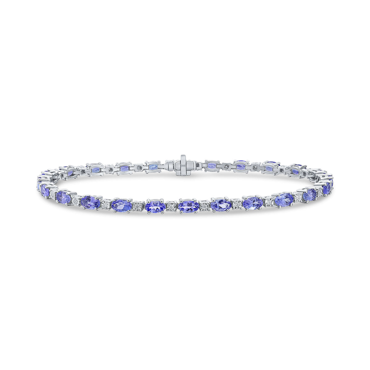 18CT WG OVAL TANZANITE & DIAMOND CLAW SET LINE BRACELET