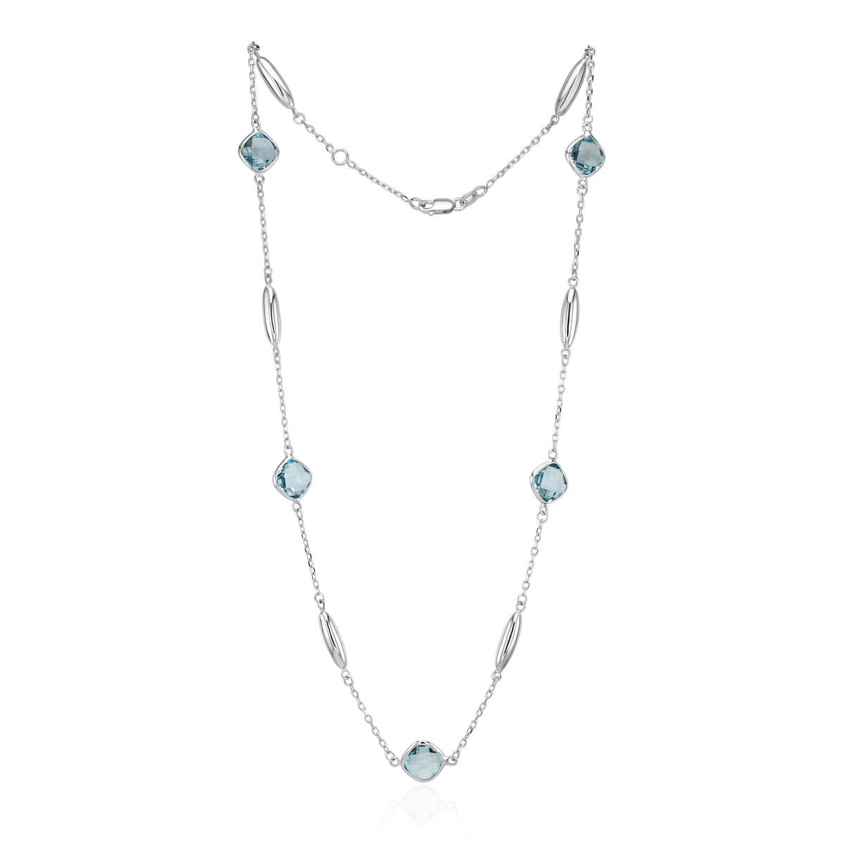 9CT WHITE GOLD CHECKERBOARD CUSHION BLUE TOPAZ, POLISHED TORPEDO MOTIF AND CHAIN NECKLACE
