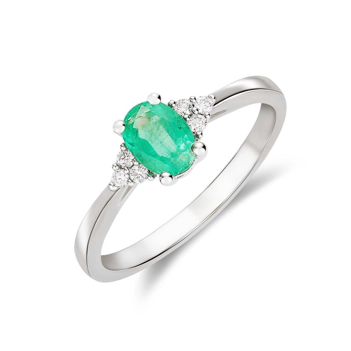 9CT WG 7X5 OVAL EMERALD & DIAMOND TREFOIL SHOULDERS CLAW SET  RING