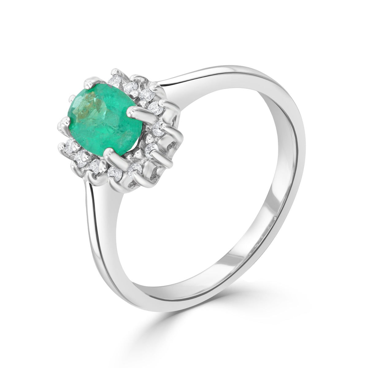 9CT WG 7X5 OVAL EMERALD & DIAMOND CLAW SET CLUSTER RING