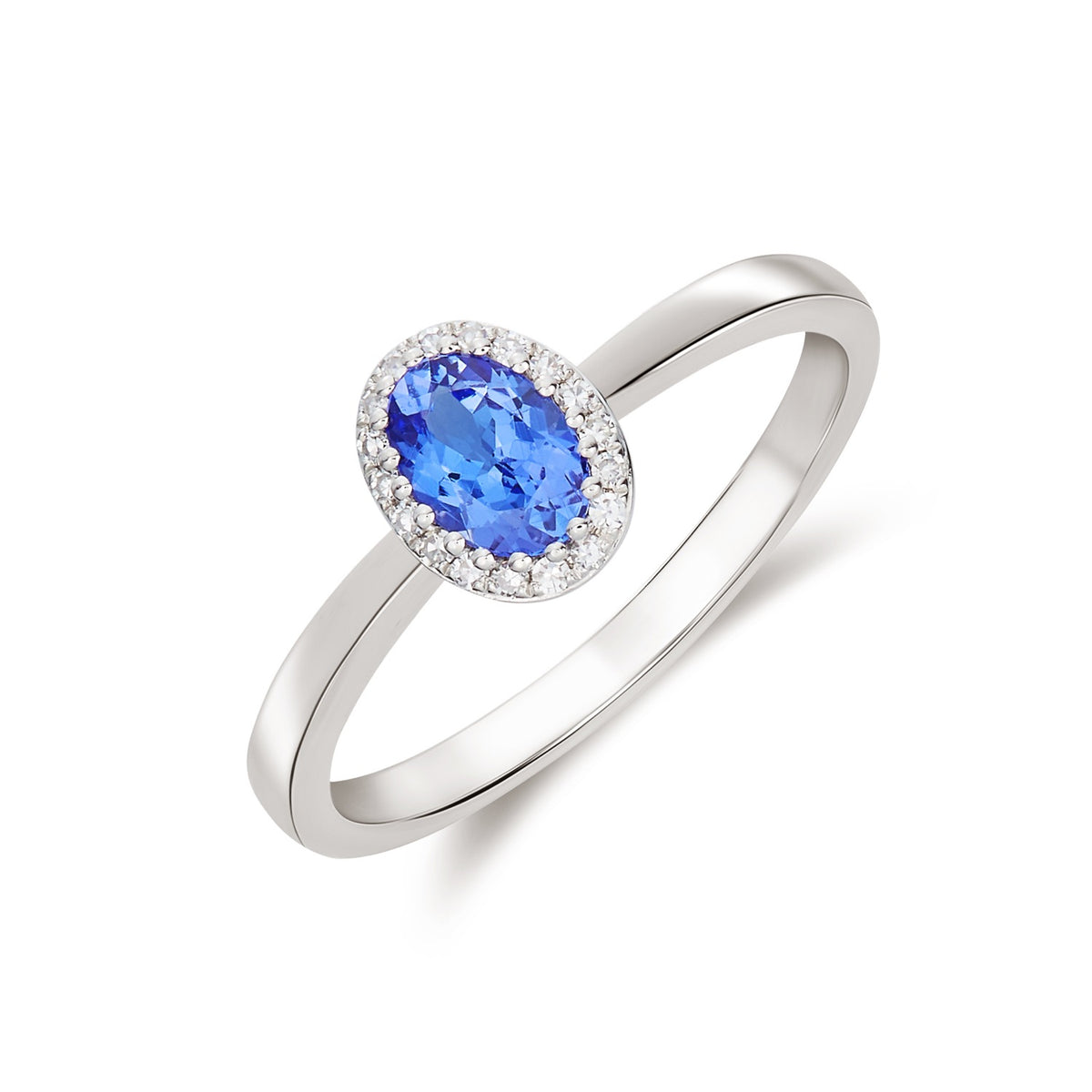 9CT WHITE GOLD OVAL TANZANITE AND DIAMOND CLAW CLUSTER RING