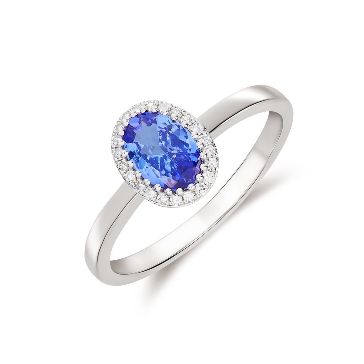 9CT WG 7X5 OVAL TANZANITE AND ROUND DIAMOND CLAW SET CLUSTER RING