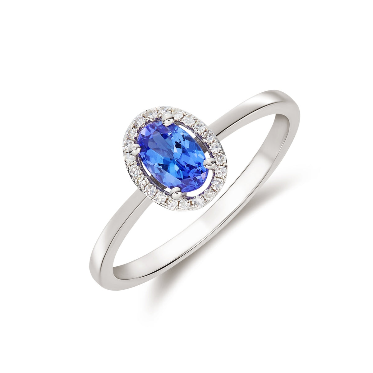 9CT WG 6X4 OVAL TANZANITE AND ROUND DIAMOND HALO CLUSTER RING