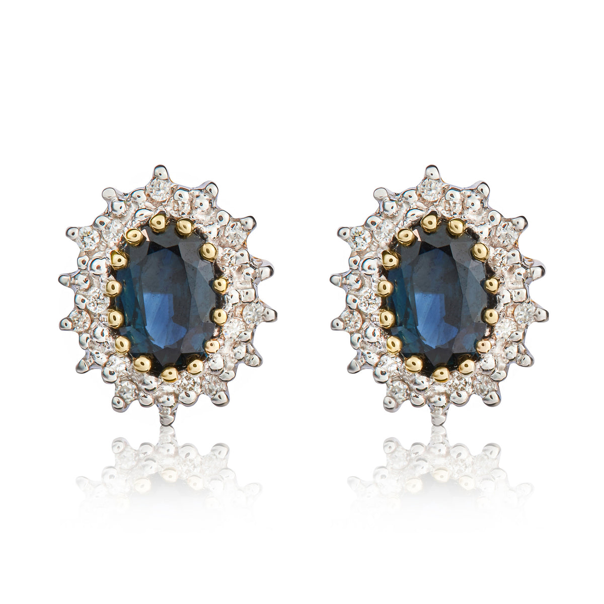 9CT YG 6X4 OVAL SAPPHIRE AND DIAMOND CLAW CLUSTER EARRINGS. RHODIUM TO DIAMONDS