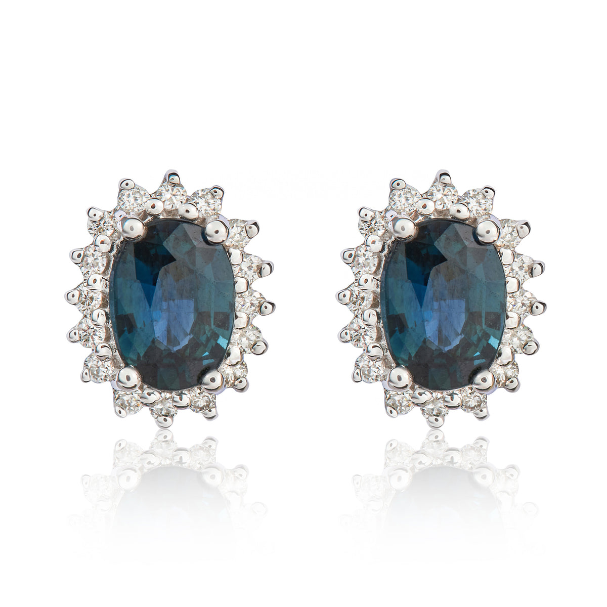 9CT WG 7X5 OVAL SAPPHIRE & DIAMOND CLAW SET CLUSTER EARRINGS
