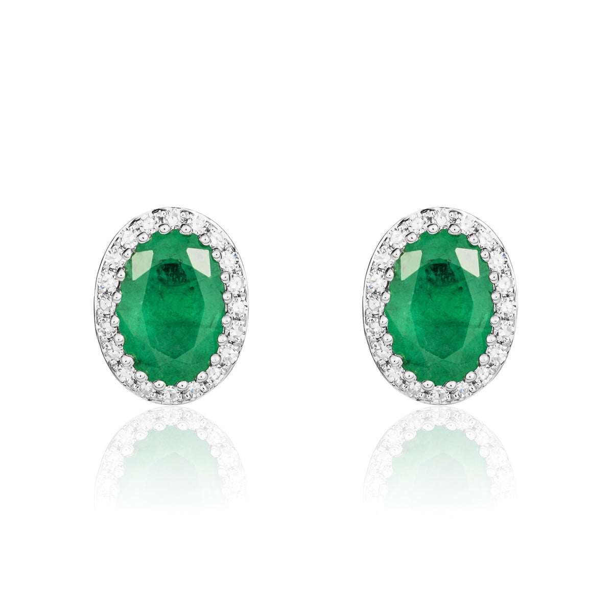 9CT WG 7X5 OVAL EMERALD AND ROUND DIAMOND CLAW CLUSTER EARRINGS