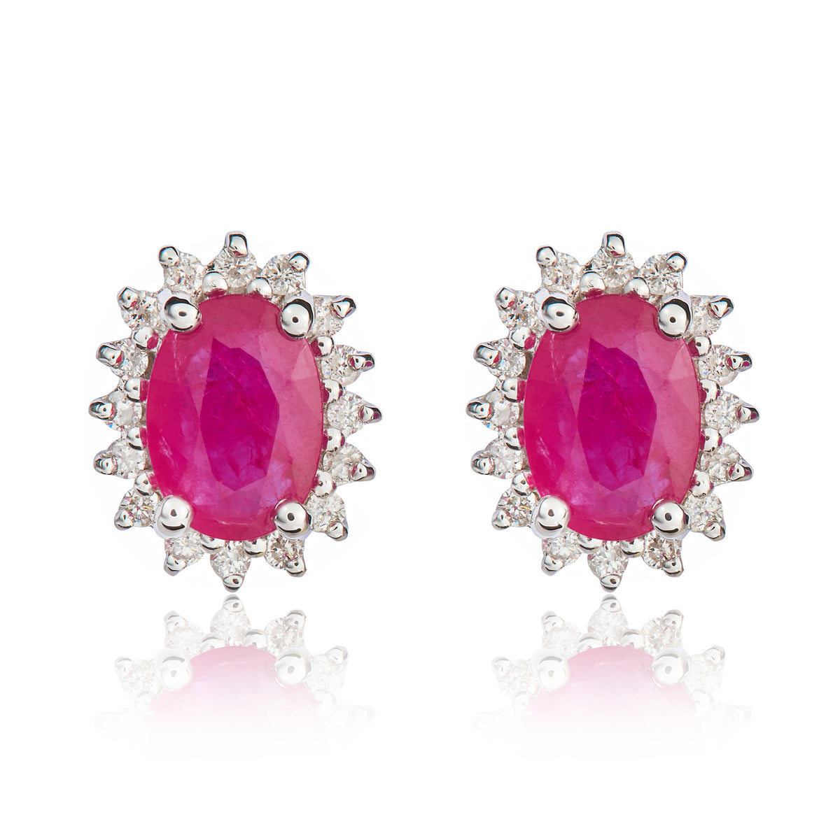 9CT WG 7X5 OVAL RUBY & DIAMOND CLAW SET CLUSTER EARRINGS