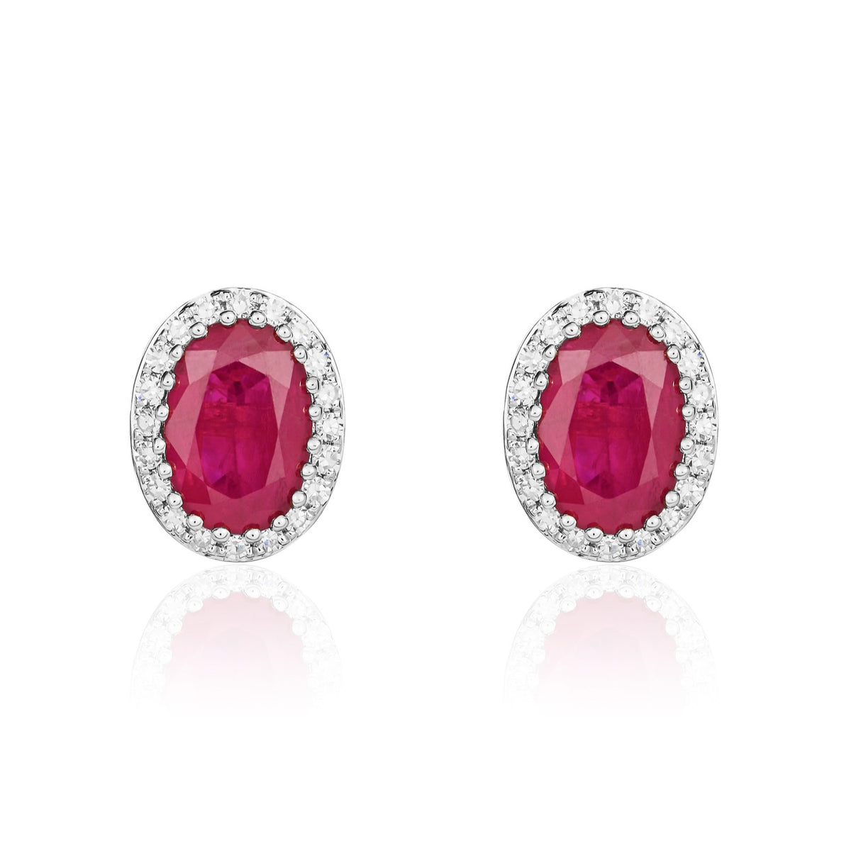 9CT WG 7X5 OVAL RUBY AND ROUND DIAMOND CLAW SET CLUSTER EARRINGS