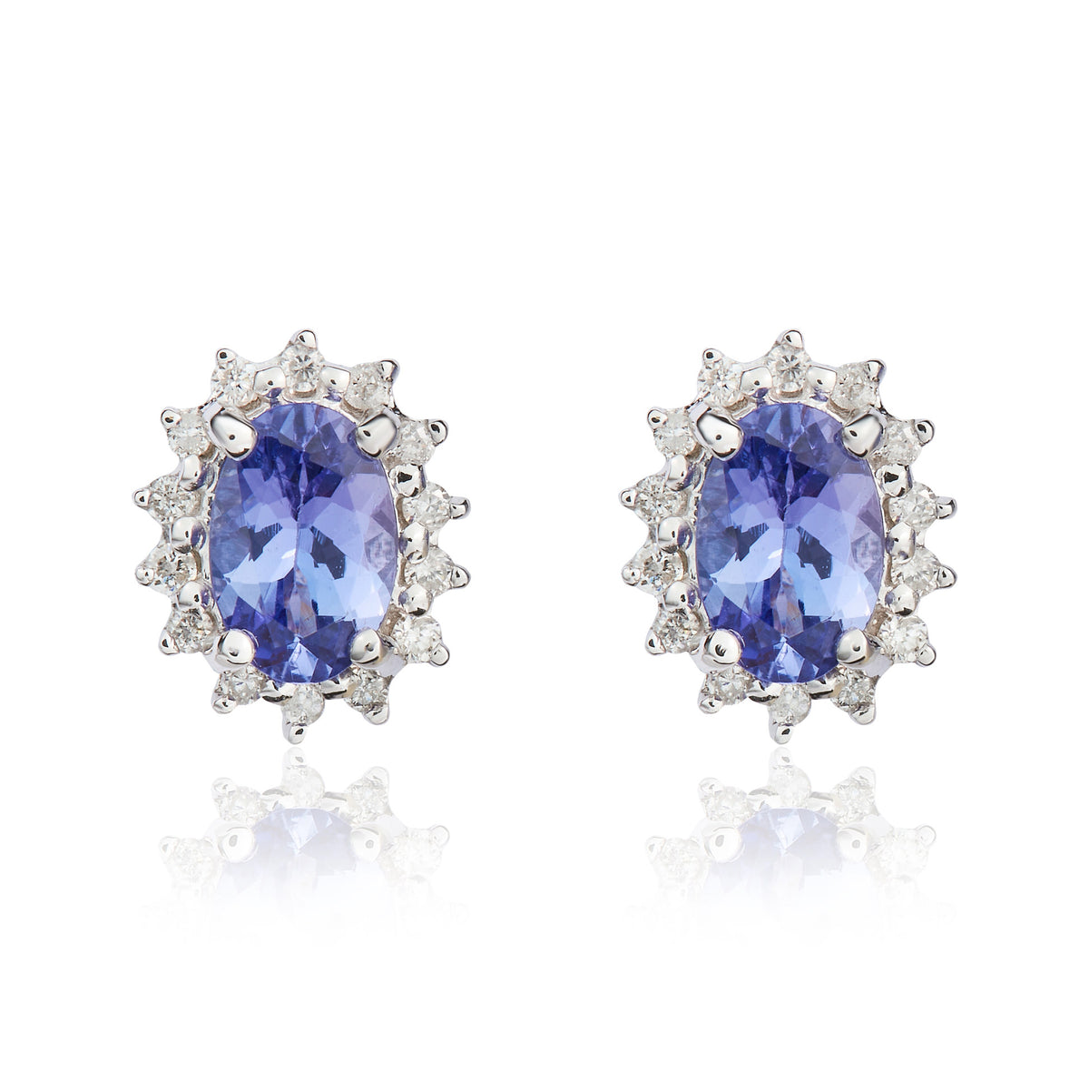 9CT WG 6X4 OVAL TANZANITE & DIAMOND CLAW SET CLUSTER EARRINGS