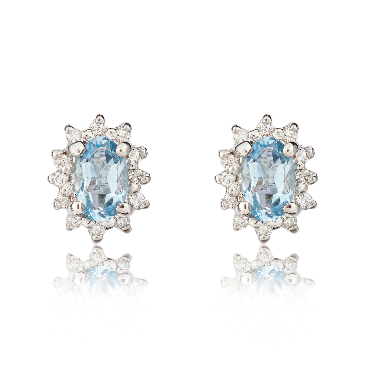9CT WG 5X3 OVAL AQUA & DIAMOND CLAW SET CLUSTER EARRINGS