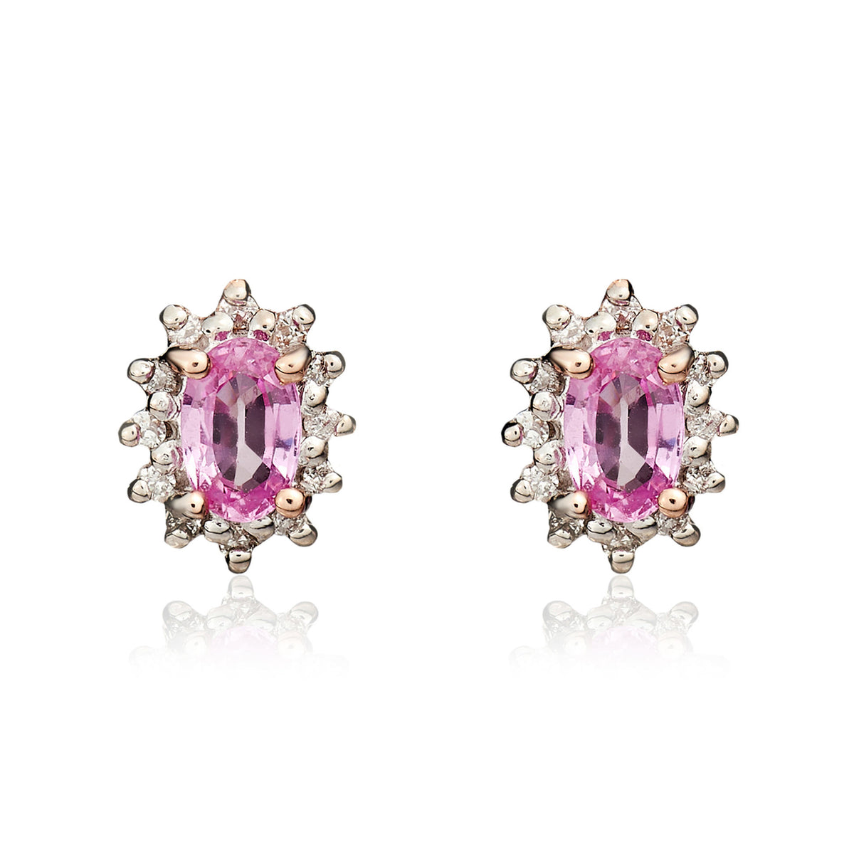 9CT RG 5X3 OVAL PINK SAPPHIRE & DIAMOND CLAW SET CLUSTER EARRINGS. RHODIUM TO DIAMONDS