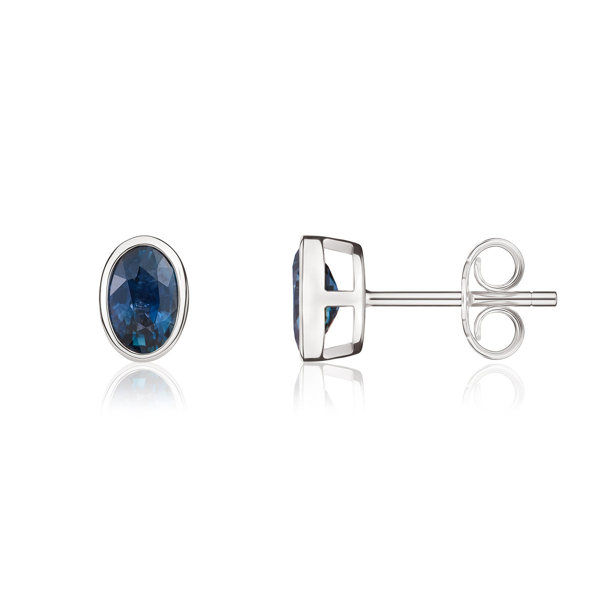 9CT WG 6X4 OVAL SAPPHIRE RUBOVER STUD EARRINGS