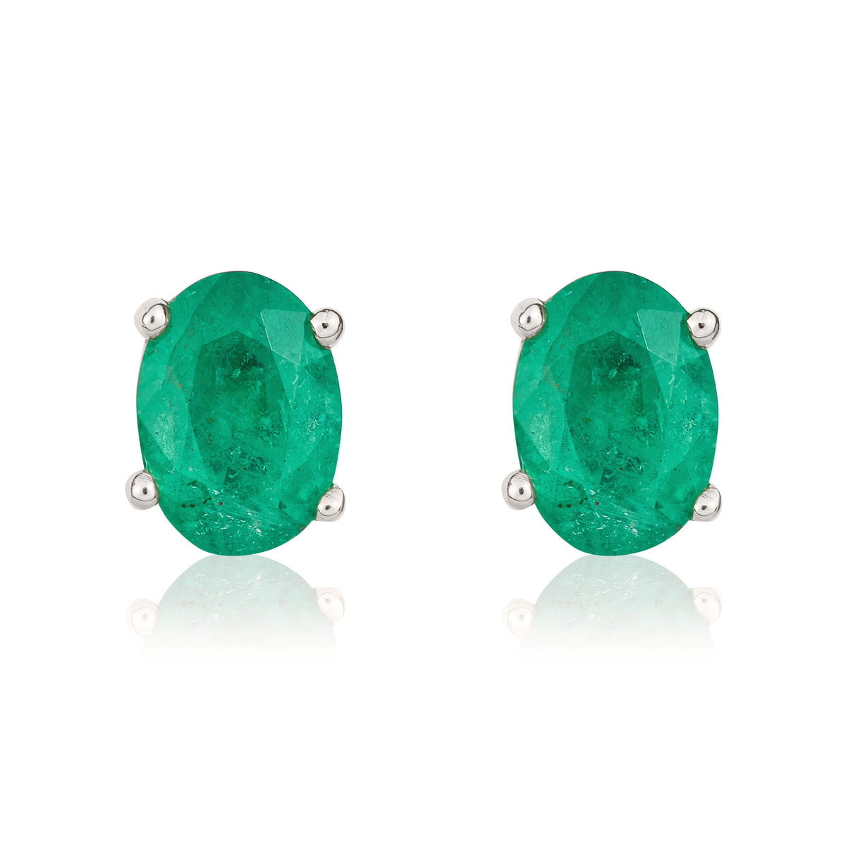 9CT WHITE GOLD 7X5MM OVAL EMERALD CLAW EARRINGS