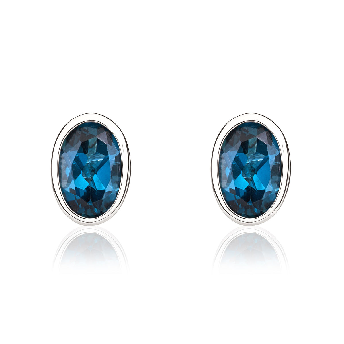 9CT WG 6X4 OVAL LONDON BLUE TOPAZ RUBOVER STUD EARRINGS
