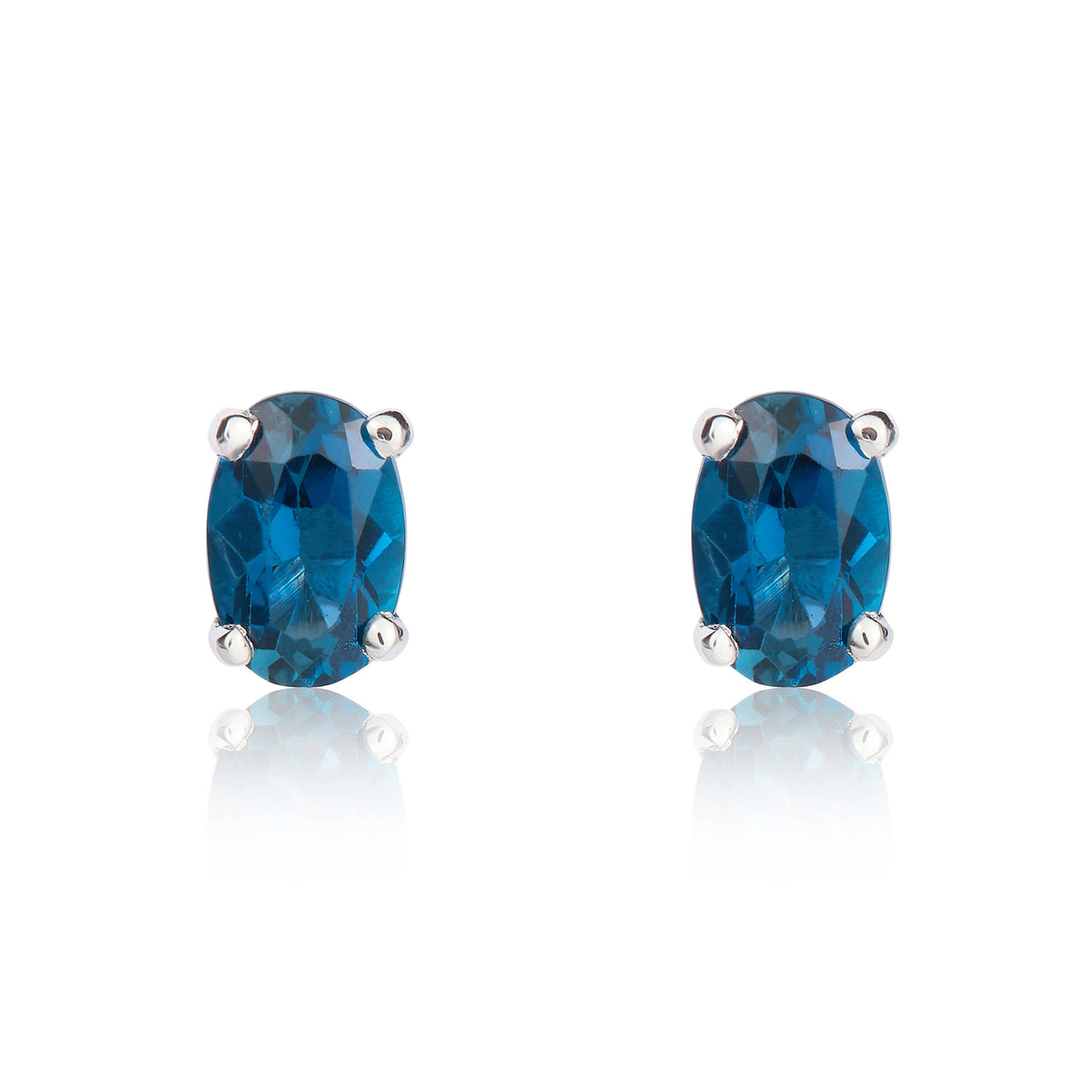 9CT WG 6X4 OVAL LONDON BLUE TOPAZ CLAW SET EARRINGS