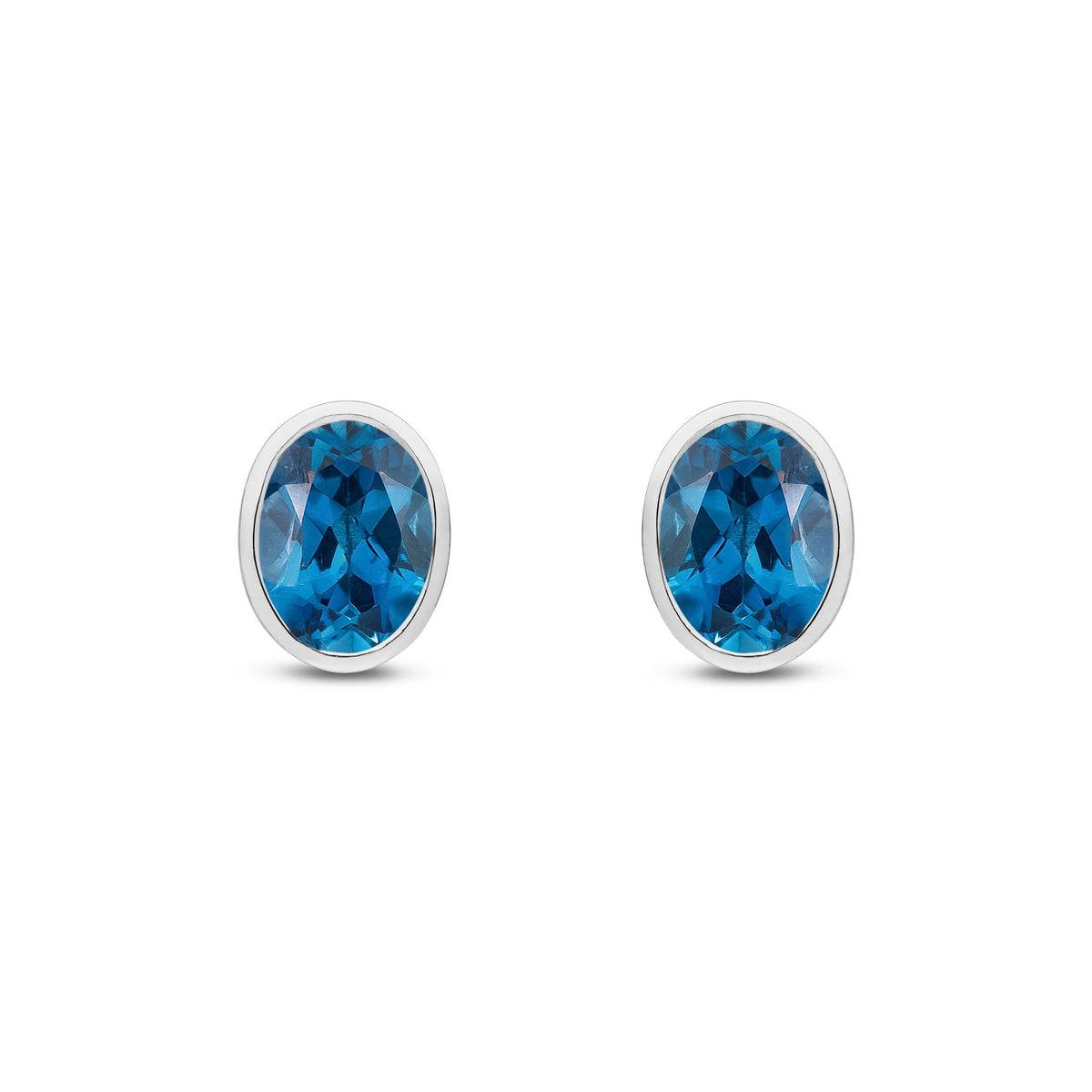 9CT WG 8X6 OVAL LONDON BLUE TOPAZ RUBOVER EARRINGS