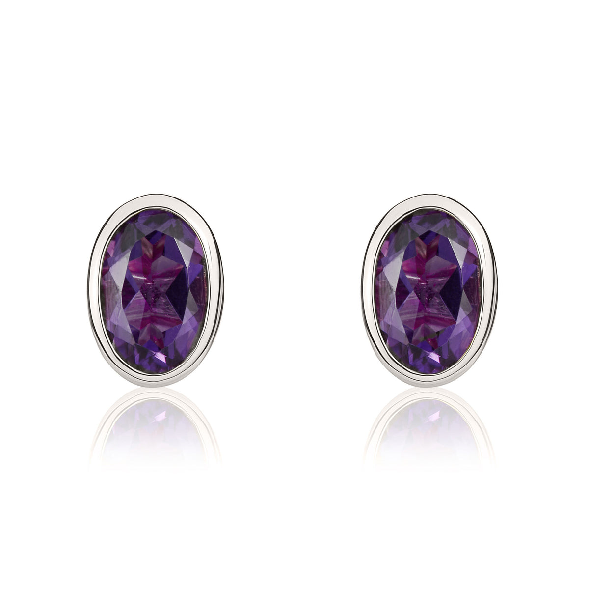 9CT WG 6X4 OVAL AMETHYST RUBOVER STUD EARRINGS