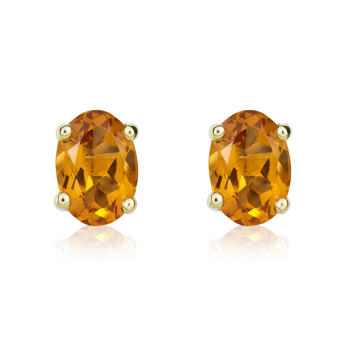 9CT YG 7X5 OVAL CITRINE CLAW STUD EARRINGS