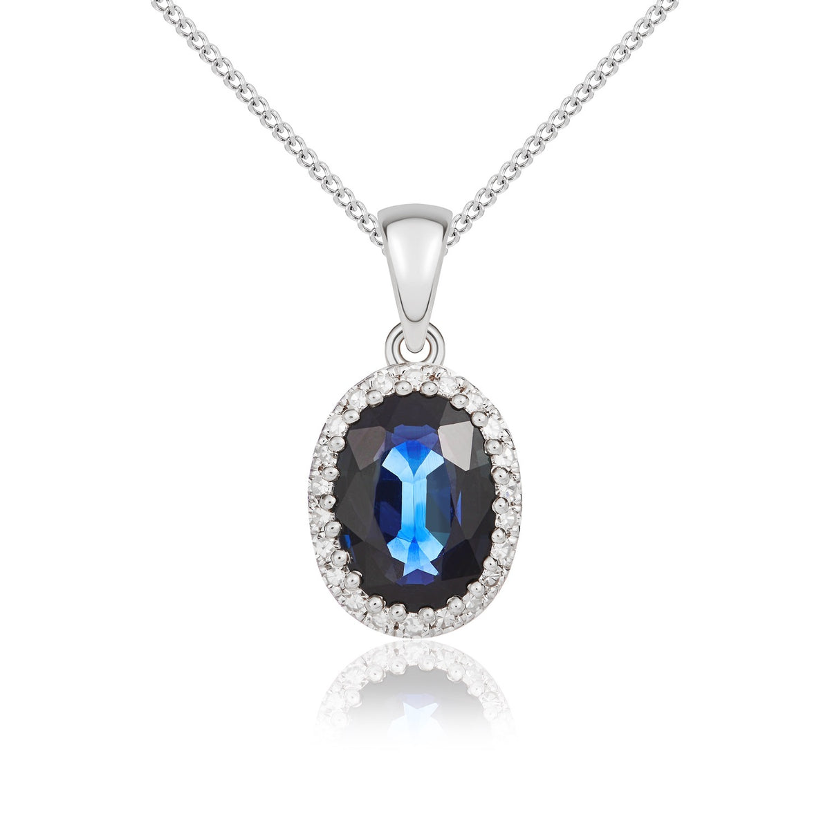 9CT WHITE GOLD OVAL SAPPHIRE AND ROUND DIAMOND CLAW SET CLUSTER PENDANT WITH PLAIN LOOP