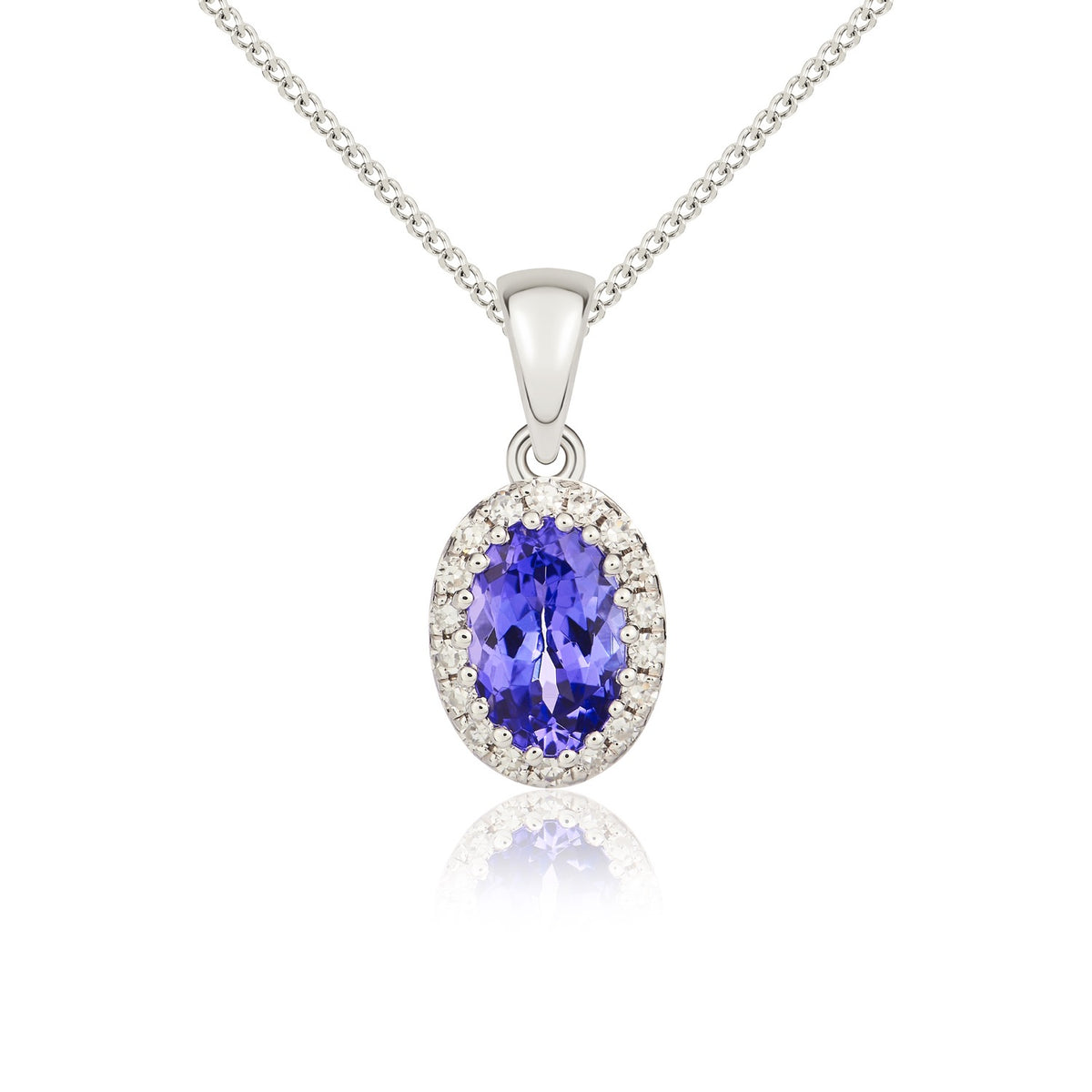 9CT WHITE GOLD OVAL TANZANITE AND DIAMOND CLAW CLUSTER PENDANT