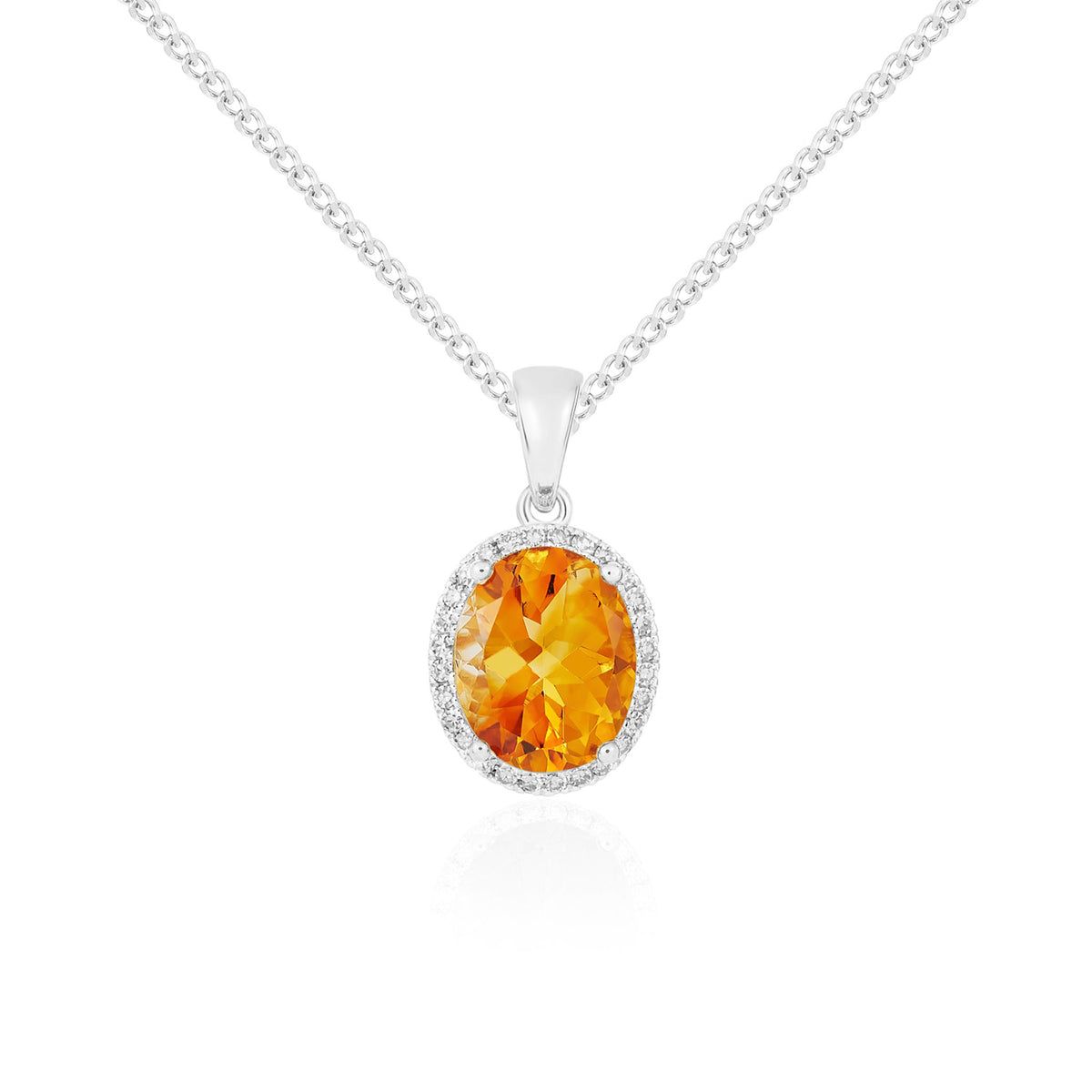 9CT WG 10X8 OVAL CITRINE AND DIAMOND CLAW SET CLUSTER PENDANT