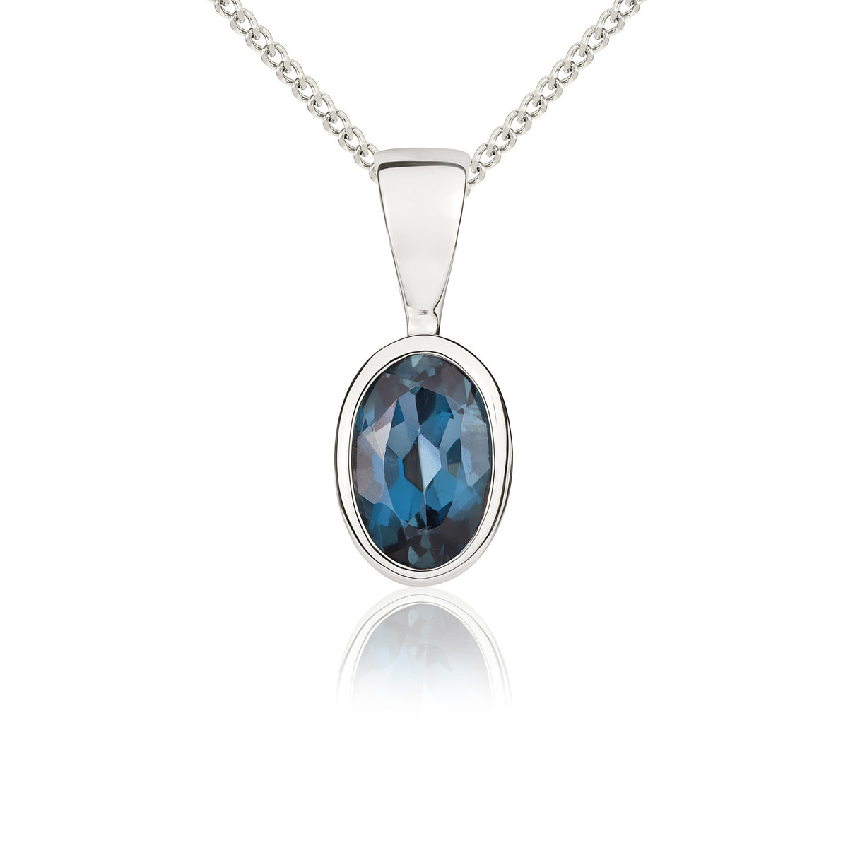 9CT WG 6X4 OVAL LONDON BLUE TOPAZ RUBOVER PENDANT