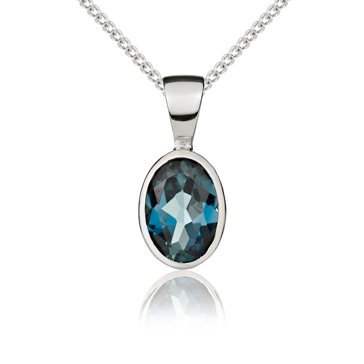 9CT WG 7X5 OVAL LONDON BLUE TOPAZ RUBOVER PENDANT