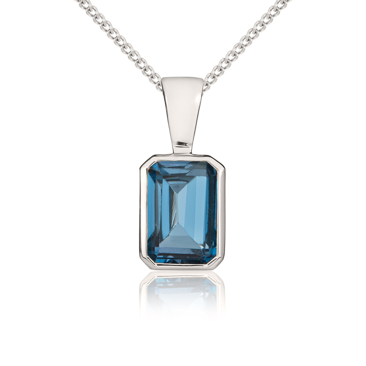 9CT WG 7X5MM OCTAGON LONDON BLUE TOPAZ RUBOVER PENDANT