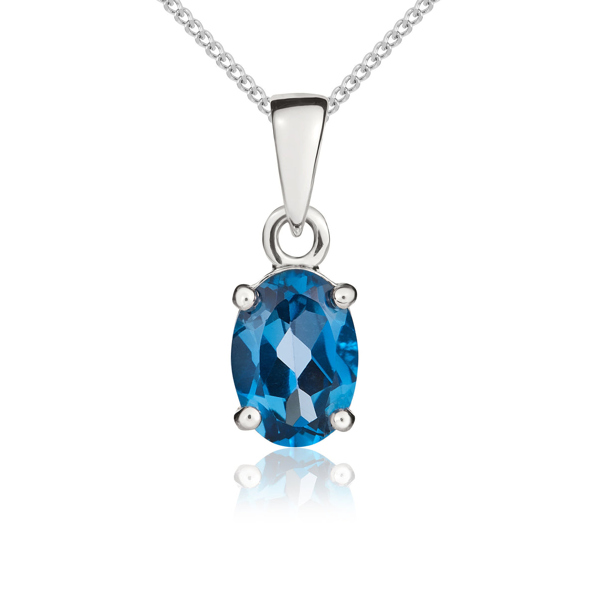 9CT WG 7X5MM OVAL LONDON BLUE TOPAZ 4 CLAW PENDANT